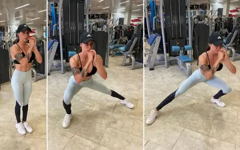 Donna in palestra esegue affondo laterale, lavorando l'adduttore breve.