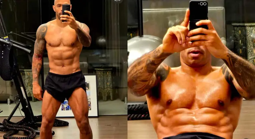 Fisico da calciatore scolpito, addominali definiti e muscoli in vista. Un uomo mostra il suo fisico atletico in palestra.